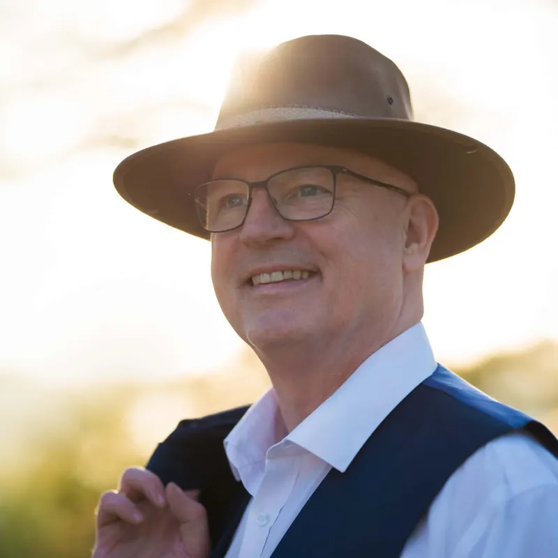 Guest medium Fredrick Haugland smiling in golden evening light
